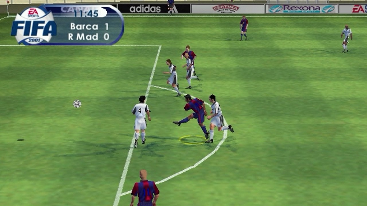 Screenshot of FIFA 2001 on PC, with a player shooting the ball surrounded by defenders